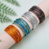 Wholesale Bohemian minimalist style imitation gold thread multi-layer PU leather women's bracelet with magnetic clasp.