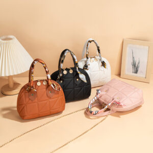 Wholesale Women's handbags 2025 new style, textured niche handbags, shell-shaped, triangular embroidered, cross-border trendy small bags for women.