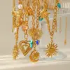 Wholesale Oceanic Style Irregular Pearl Stainless Steel Necklace Sun And Heart Pattern Vacuum Plated 18K Gold Casual Beachy Lobster Clasp