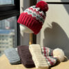 Wholesale Christmas wool hat for women, warm and cute winter pom-pom ear flap hat