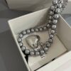Wholesale South Korea Dongdaemun Rice Beads Titanium Steel Necklace Hollow Love Pendant Grey Fine Pearl Necklace Woolen Chain Women