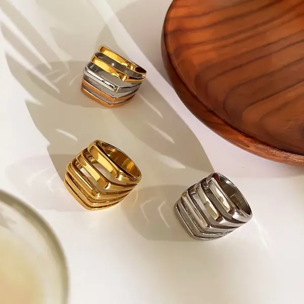 Wholesale 304 Stainless Steel Geometric PVD Coated Real Gold Plated Novelty IG Style Waterproof Non Tarnish Criss Cross Surgical Steel Gold Silver Rings