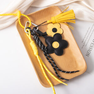 2 miu lanyards - yellow tassels - black and yellow flowers