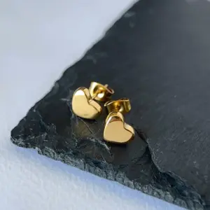 Gold stud earrings