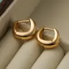 Wholesale 1 Pair Simple Style Commute Solid Color Copper Asymmetrical Plating 18k Gold Plated Hoop Earrings