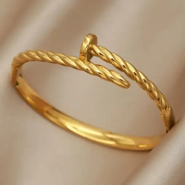 Wholesale 304 Stainless Steel Twist Ion Plating (IP) Real Gold Plated Simple Style Classic Style Waterproof Non Tarnish Asymmetrical Buckle Gold Bangle