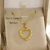 Wholesale Ion Plating (IP) 18K Gold Plated 18K Gold Sun Heart Shape Bow Knot 201 Stainless Steel 304 Stainless Steel Simple Style Classic Style 201 Stainless Steel Pendant Necklace