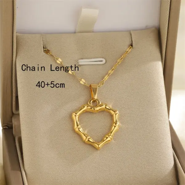 Wholesale Ion Plating (IP) 18K Gold Plated 18K Gold Sun Heart Shape Bow Knot 201 Stainless Steel 304 Stainless Steel Simple Style Classic Style 201 Stainless Steel Pendant Necklace