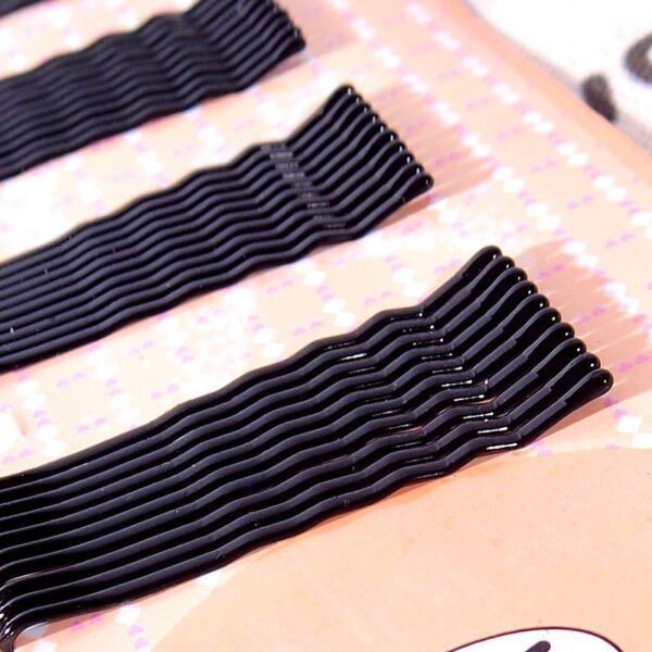 Wholesale Korean version of jewelry classic black fine hairpin edge clip stall supply a small commodity