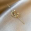 oly-56a477313b09ec5293bf011a84d552ee Wholesale Korean Style Simple Cold Style Zircon Flash Diamond Earrings Ear Hanging Distinctive Puncture Ear Needle Fashion Trend Earrings