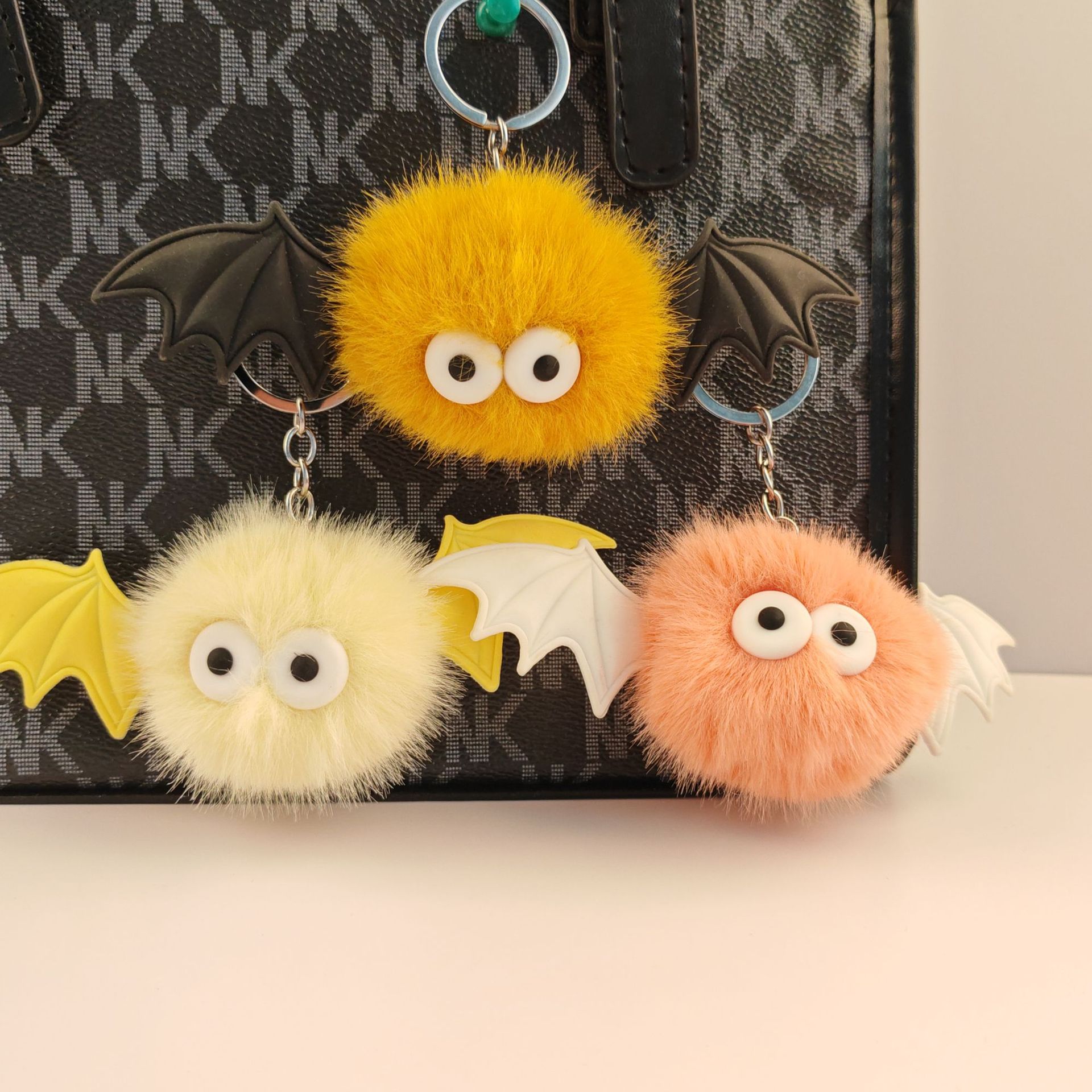 Wholesale Cute Cartoon Little Devil Plush Ball Pendant Funny Style Student Bag Keychain Aessories Fur Ball Manufacturer