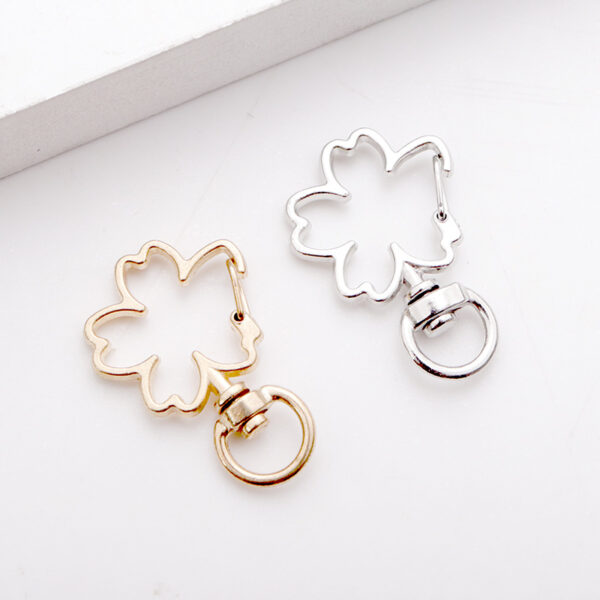 Wholesale Factory direct shaped keychain metal cat dolphin love five-pointed star cherry blossom shell jewelry accessories diy
