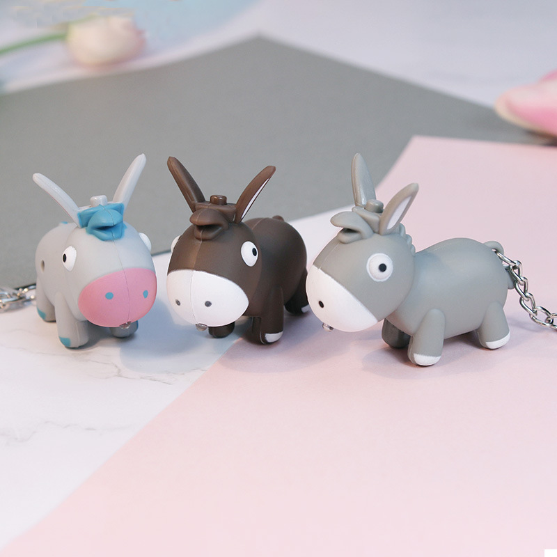 Wholesale Sound luminous cartoon donkey silly keychain chilen's schoolbag pendant lage aessories toy manufacturers st