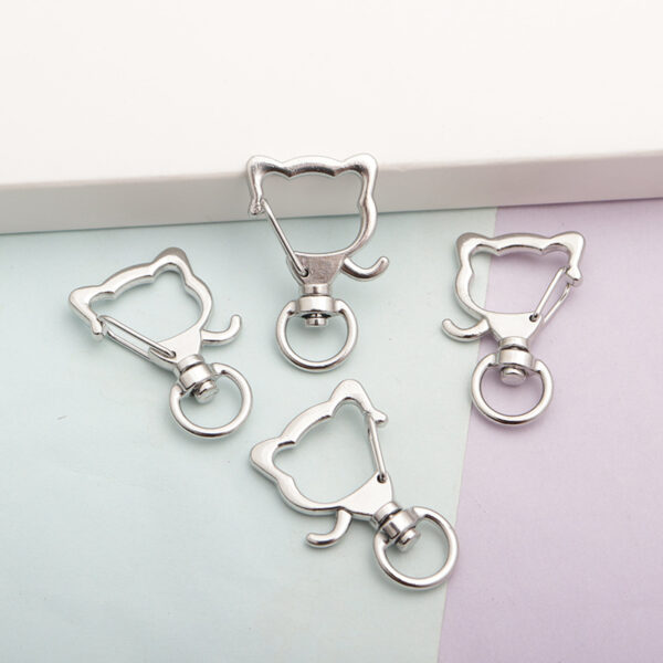 Wholesale Factory direct shaped keychain metal cat dolphin love five-pointed star cherry blossom shell jewelry accessories diy