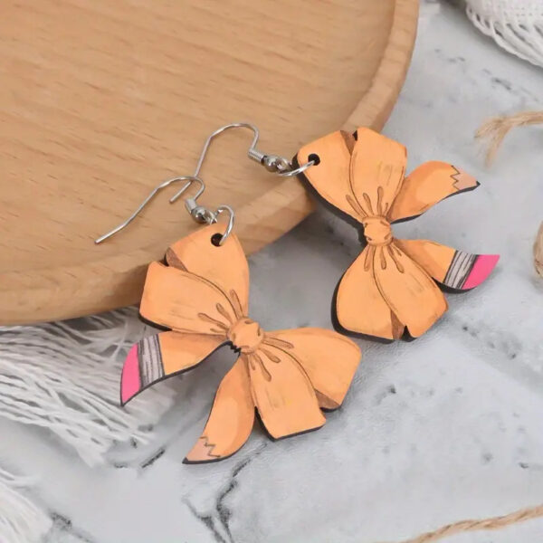 oly-5972c57b496edf40eb69ce55c43484c4 Wholesale Back-to-school creative pencil bow wooden earrings