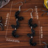 oly-597c798f867d82c413bbb8bb26ea2af5 Wholesale Cross Border Halloween White Ghost Black Bat Triple Stitching Pendant Earrings Acrylic Gothic Wind Earrings
