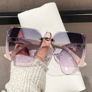 Wholesale 2025 New Frameless Fashion Sunglasses Women's Small Fragrance Light Luxury Large Frame Sunglasses Showing Face Small Easiest for Match Live Broadcast