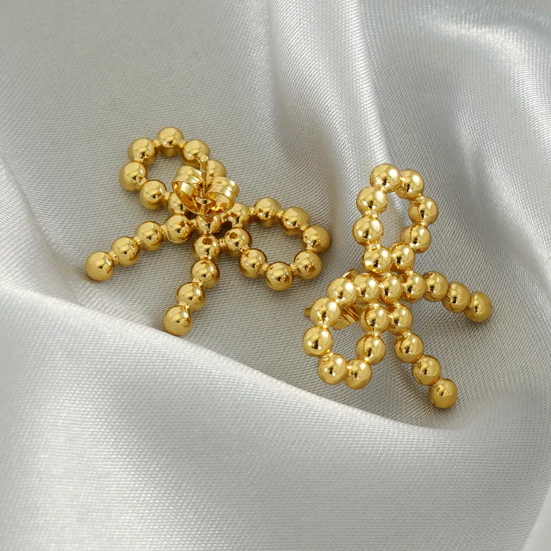 Wholesale 1 Pair Simple Style Classic Style Bow Knot Plating 304 Stainless Steel Ear Studs