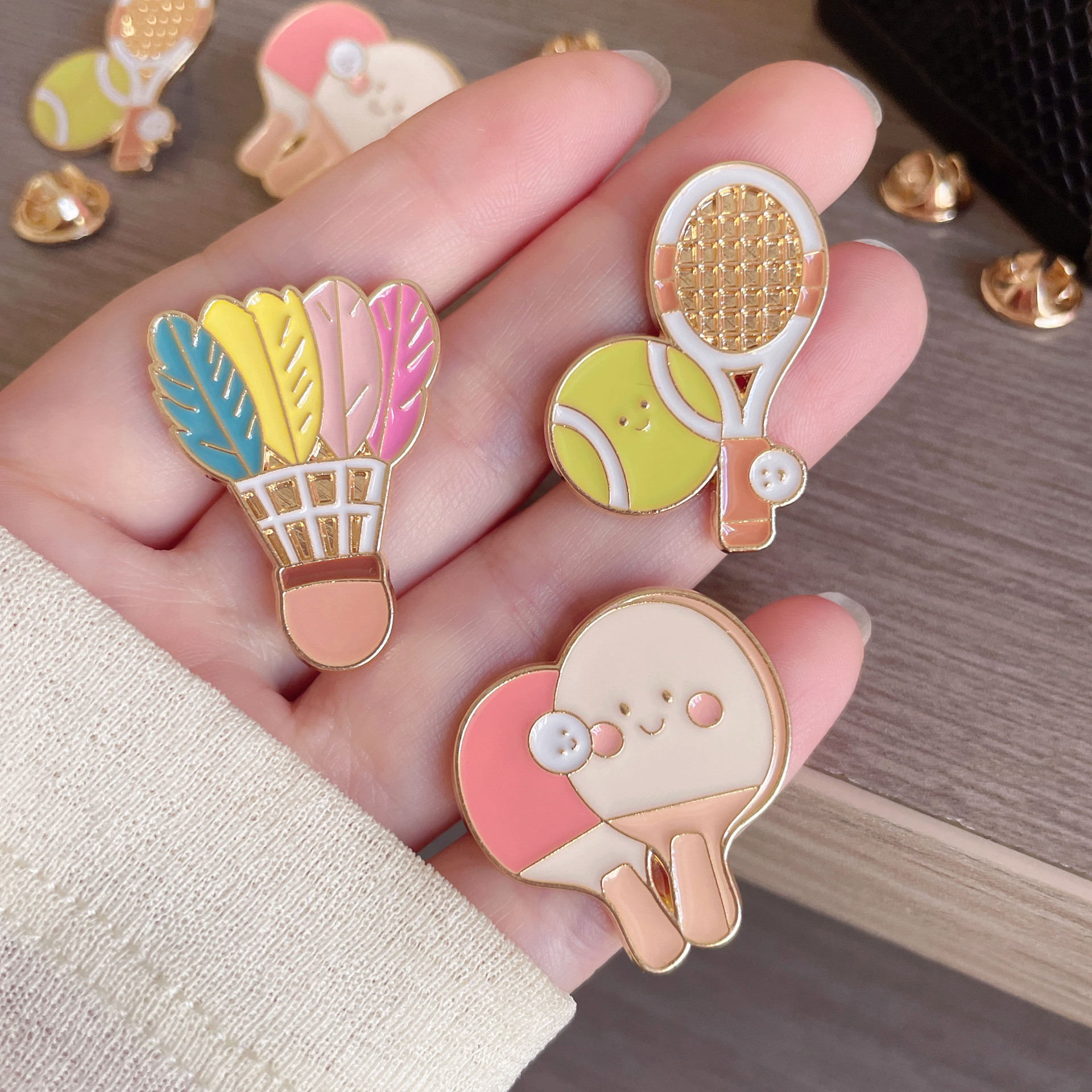 Wholesale Badminton and table tennis brooches are available