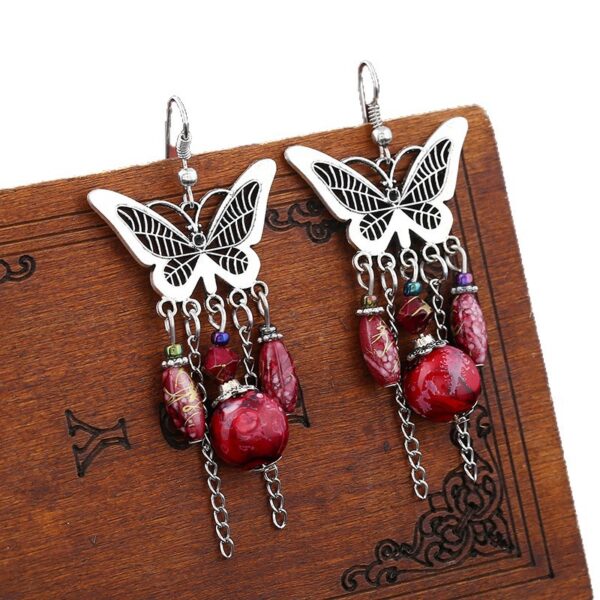 Wholesale European and American Retro Hollow Butterfly Tassel Earrings Fashion Jewelry Chain Tassel Personalized Earrings