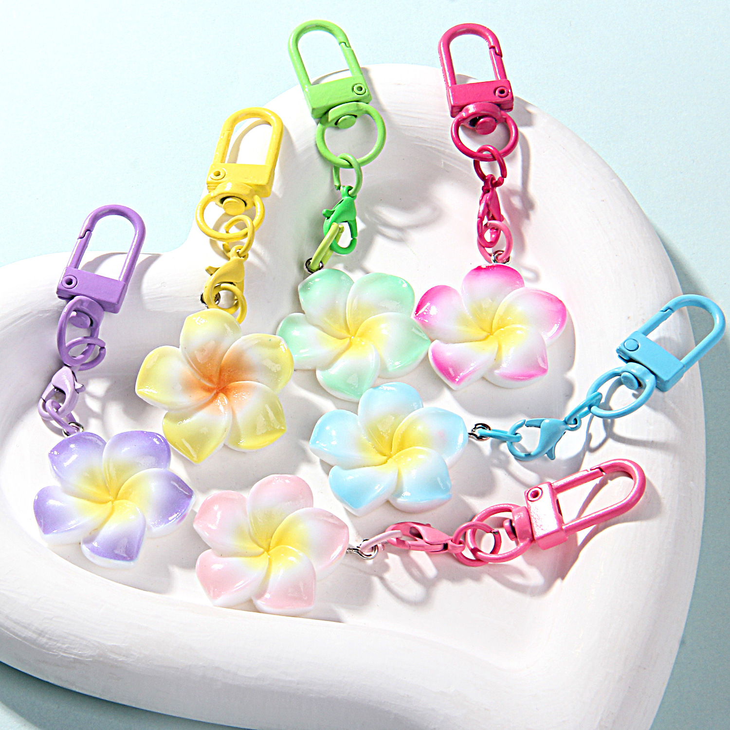 Wholesale Small fresh air key chain pendant two-color spray-painted e flower chilen's prize ints exchange small gifts