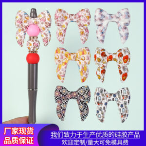 oly-5ba953381c5bc65edc735a341e819d5c Wholesale Silicone beads with bow