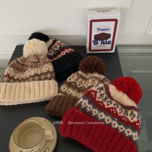 Wholesale Knitted hat with pom-poms, warm woolen hat