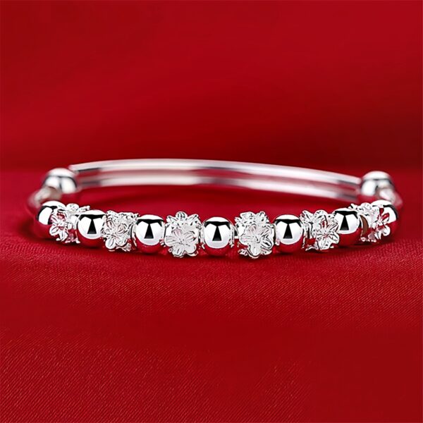 Wholesale Bloom plum rotating bead bracelet push-pull opening happy Bloom plum bracelet online celebrity fresh young Chinese Valentine's Day gift