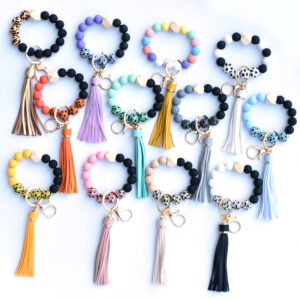 Wholesale Colorful leopard print silicone beaded bracelet keychain PU tassel pendant