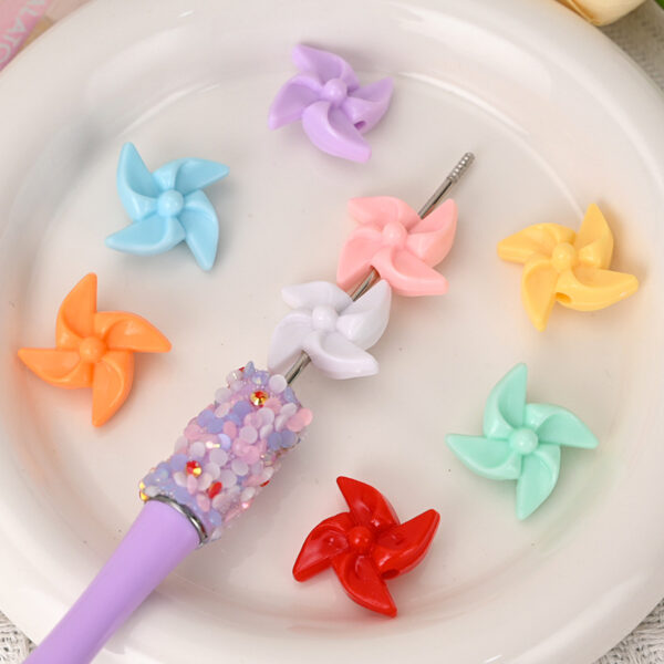 oly-5f7e3067210e05e4e26ee81aebc974a7 Wholesale Colorful small windmill loose beads with holes and special shaped beads