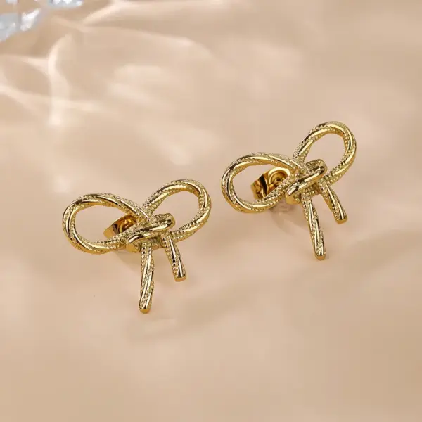 Wholesale 1 Pair Simple Style Classic Style Solid Color Bow Knot Plating 304 Stainless Steel Titanium Steel 18K Gold Plated Ear Studs