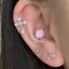 oly-600557142a104048a3997a92364efbb4 Wholesale Pink zircon cross ear bone nail titanium steel screw fireworks cut ear nail niche design butterfly earrings