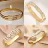 Wholesale Vacuum Plating Real Gold Plated 18K Geometric 304 Stainless Steel Glam Luxurious Classic Style Waterproof Non Tarnish Bangle