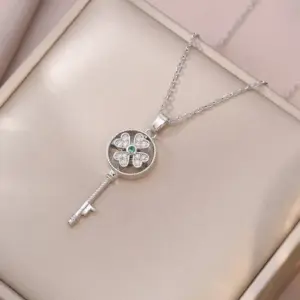 X3856 Steel Color Key Rotating Necklace
