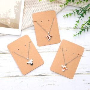 Wholesale Western style alloy mini cow head random pattern pendant simple fashion ladies jewelry necklace