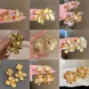 Wholesale 1 Pair Vintage Style Simple Style Flower Plating Copper Ear Studs