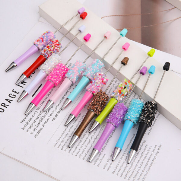 Wholesale DIY sequins beaded pen ins colorful resin ballpoint pen student gift pen can wear beads rotating cute pen