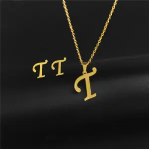 T (Gold)