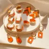 Wholesale 1 Pair Retro Sweet Triangle Devil's Eye Heart Shape Enamel Plating Inlay Copper Zircon 18k Gold Plated Ear Studs