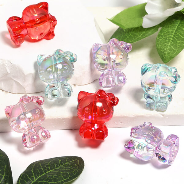 oly-62e48973972a1627a92f77ecc99a9a37 Wholesale High-transparent magic beaded stereo bow kitten vertical hole beads diy mobile phone chain keychain aessories