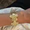 PVD Coated Real Gold Plated 18K Gold Flower 304 Stainless Steel French Style IG Style Waterproof Non Tarnish 304 Stainless Steel Bangle