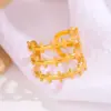 Wholesale Vacuum Plating 18K Gold Plated 18K Gold Cross Round 201 Stainless Steel Simple Style Roman Style Open Rings