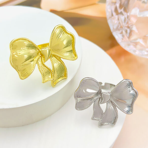 oly-637ba237ba35af66129b5ffd1b4c8492 Wholesale Cross-border retro metal bow ring ins light luxury micro-inlaid pink zircon exquisite temperament open ring female