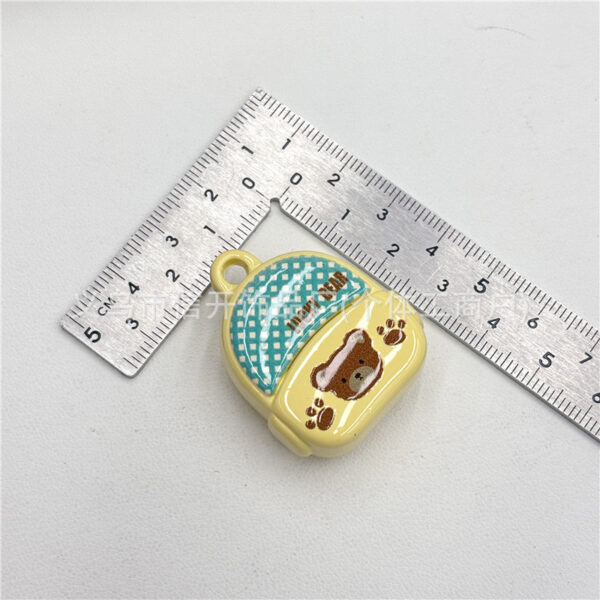 Wholesale Cartoon print beaded backpack with hanging holes