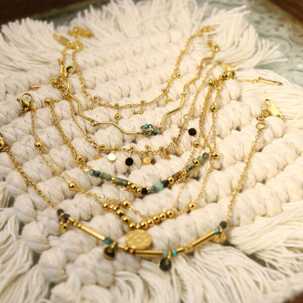 oly-63db5ac83e331ed214b56474c42d12ee Wholesale Natural stone titanium steel French retro light luxury stacking African turquoise bracelet