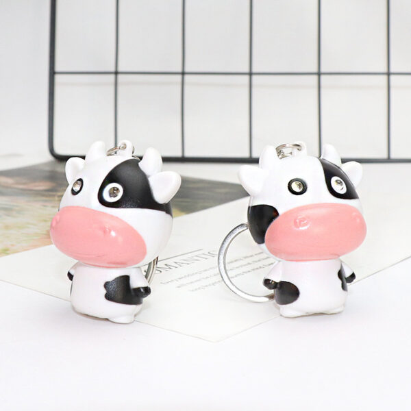 Wholesale Cartoon Sound Glowing Cow Car Keychain Cute Calf Car Pendant Student School Bag Pendant Couple Small