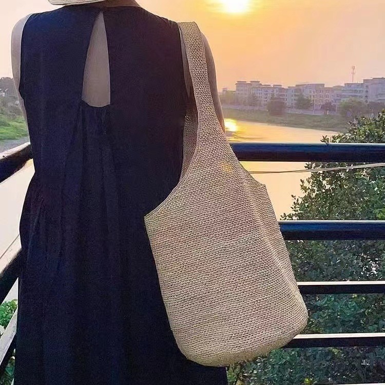 Wholesale Japanese-Korean Style Bucket Bag Handmade Woven Rafi Grass Bag Women's Summer Seaside Beach Bag Travel Shoulder Bag