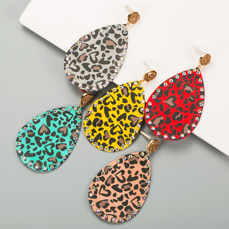 Wholesale Exaerated heavy diamond eye tassel earrings