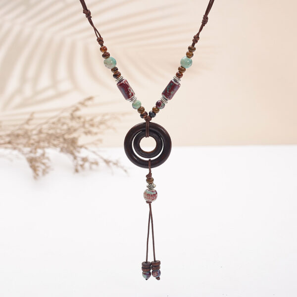 oly-655df052dfdebd09a67f10ecfaddfe3c Wholesale vintage national style ceramic necklace women's long sweater chain small jewelry aessories manufacturers
