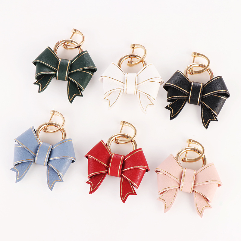 Wholesale Internet Celebrity pular Light Luxury Women's Multi-Color Fashion Imitation Leather Bow Mobile Phone Decoration Car Keychain Pendant